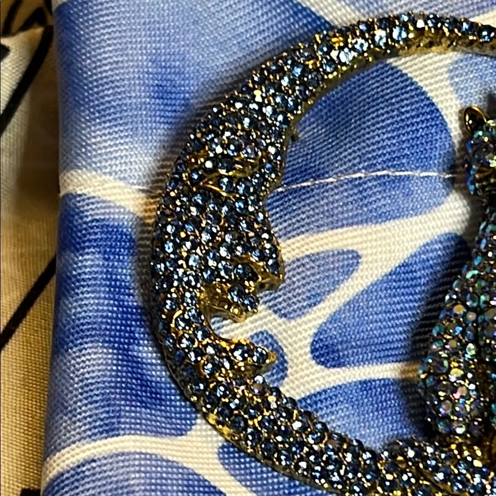 BETSEY Johnson’s Sparkling Blue and Gold Cat Brooch